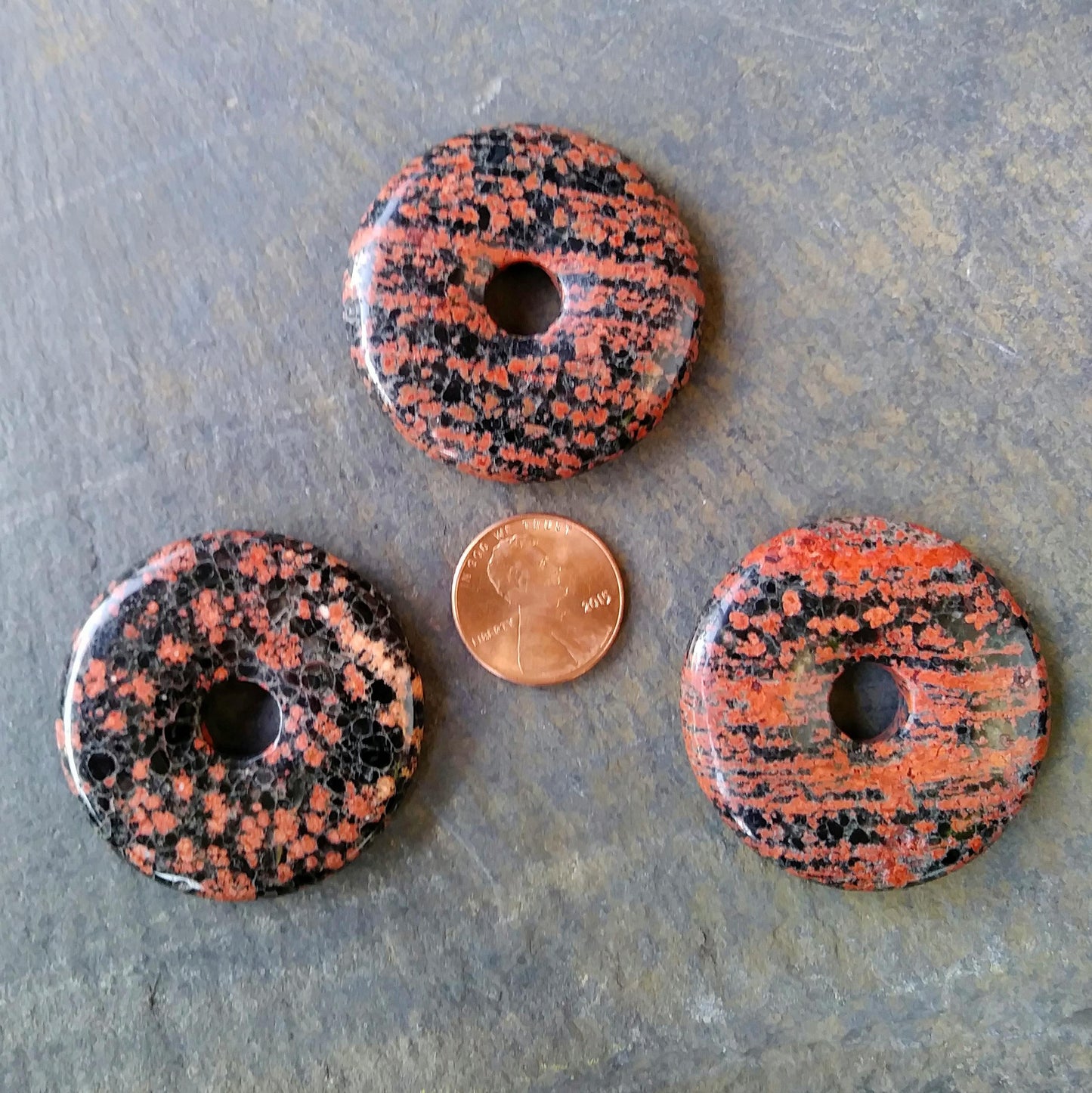 40mm Red Snowflake Jasper Stone Donut on black waxed cotton cord