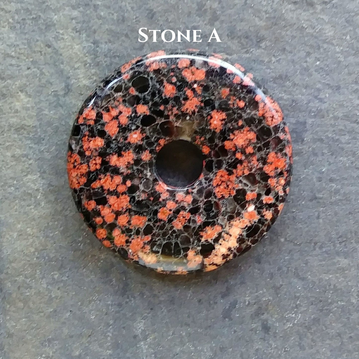 40mm Red Snowflake Jasper Stone Donut on black waxed cotton cord
