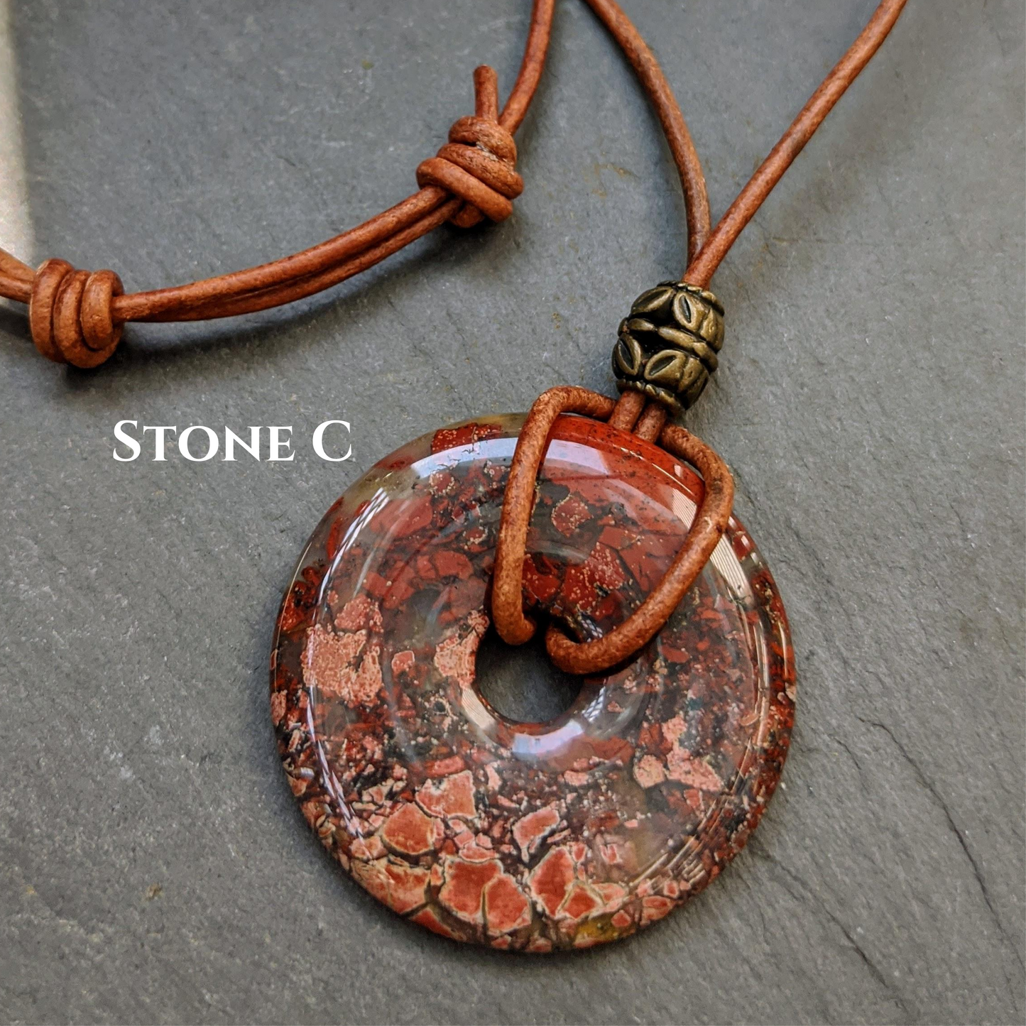 40mm Brecciated Red Jasper Stone Donut on sliding knot leather cord